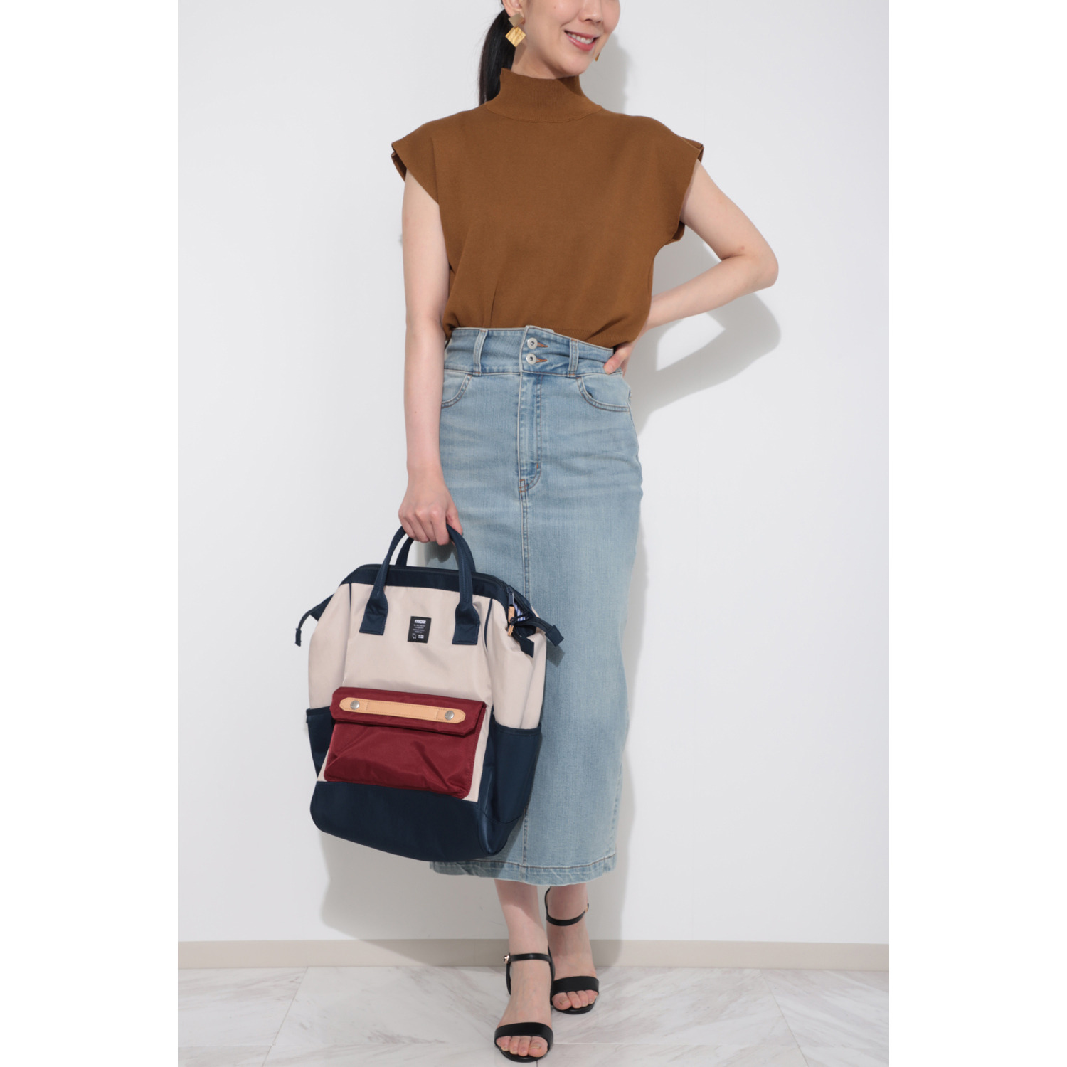 モズ 見た目以上に大容量！ ２ルーム構造 がま口リュック