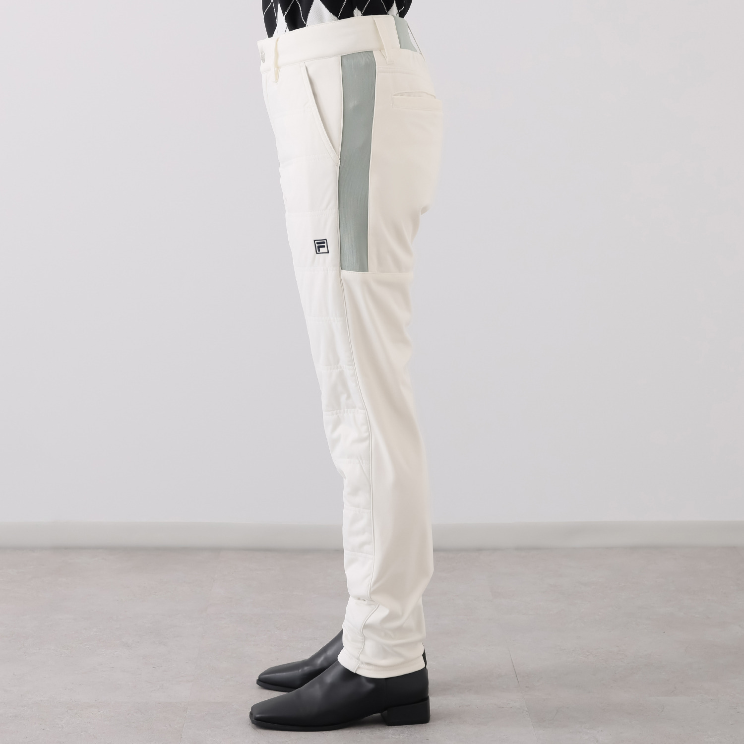 フィラ 防風・蓄熱 中綿入り ボンディングパンツ