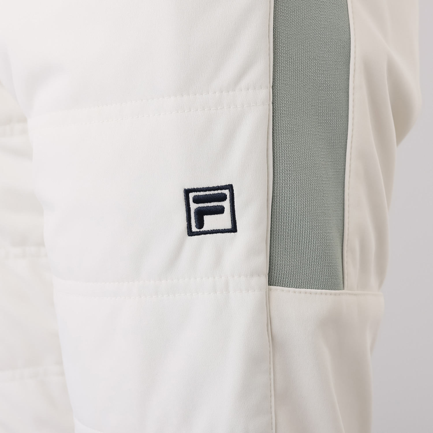 フィラ 防風・蓄熱 中綿入り ボンディングパンツ