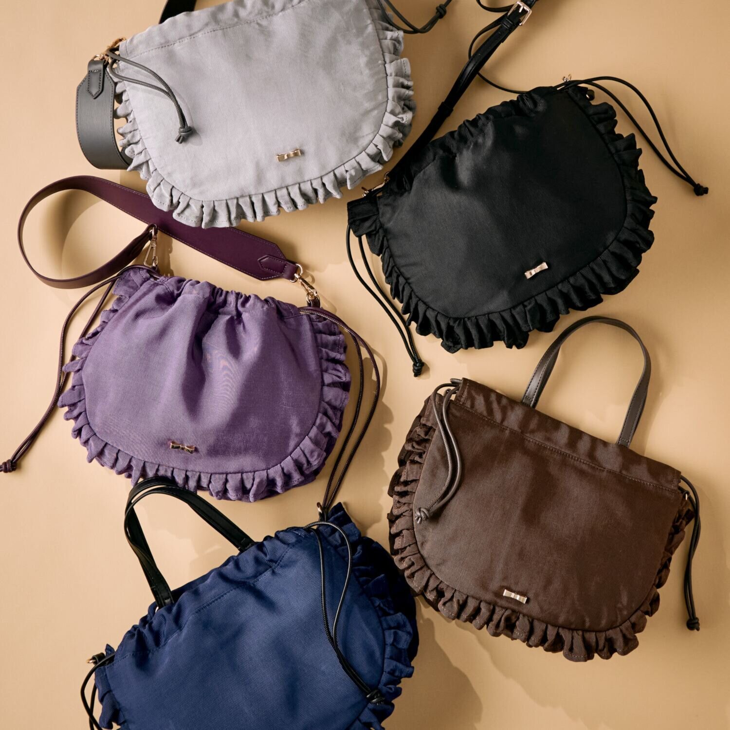 クーコ シャイニーグログラン マルチウェイ フリルバッグ