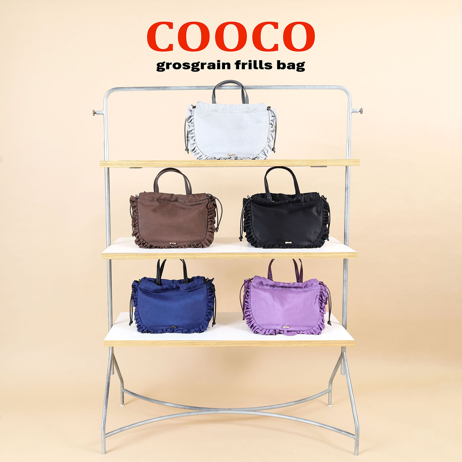 クーコ シャイニーグログラン マルチウェイ フリルバッグ