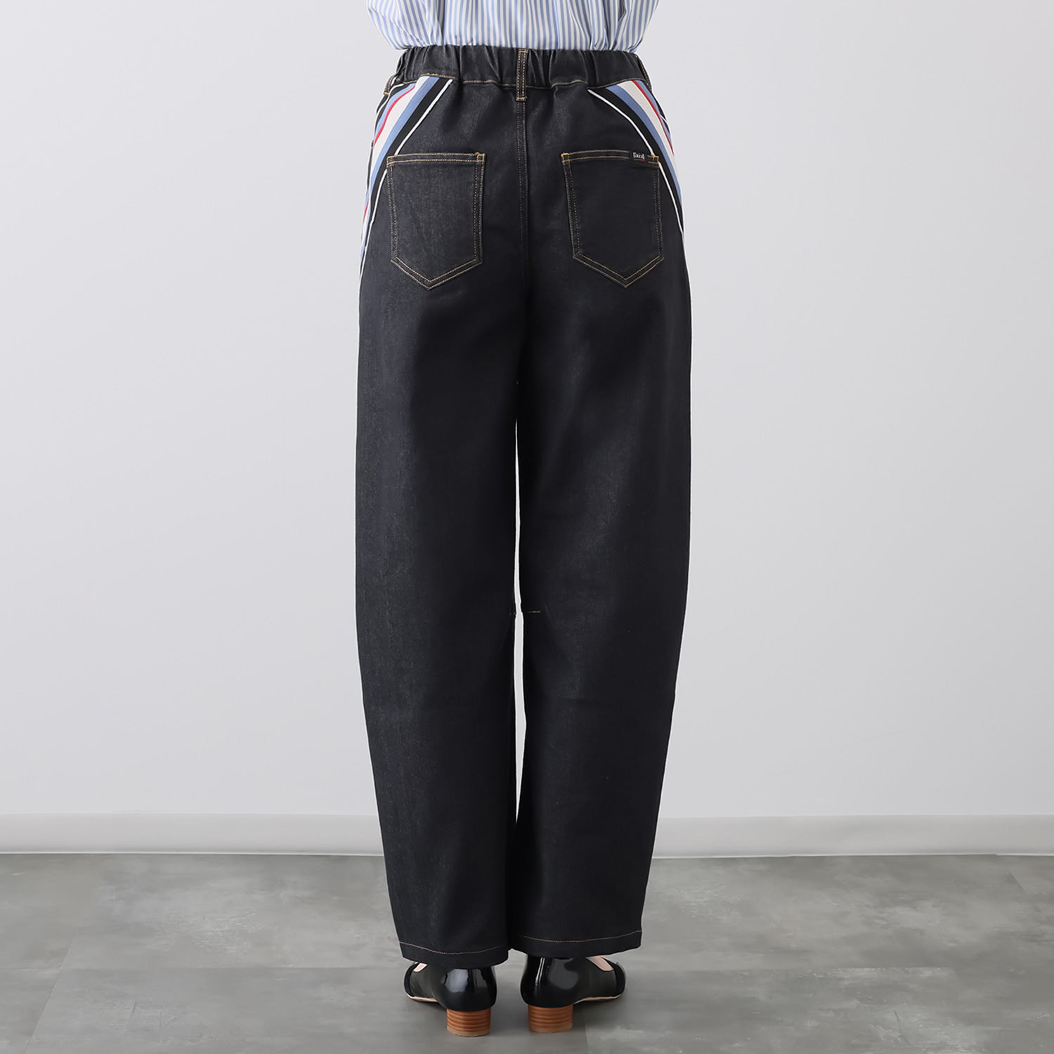 イクシーズ アクセントリブ カーブライン デニムパンツ