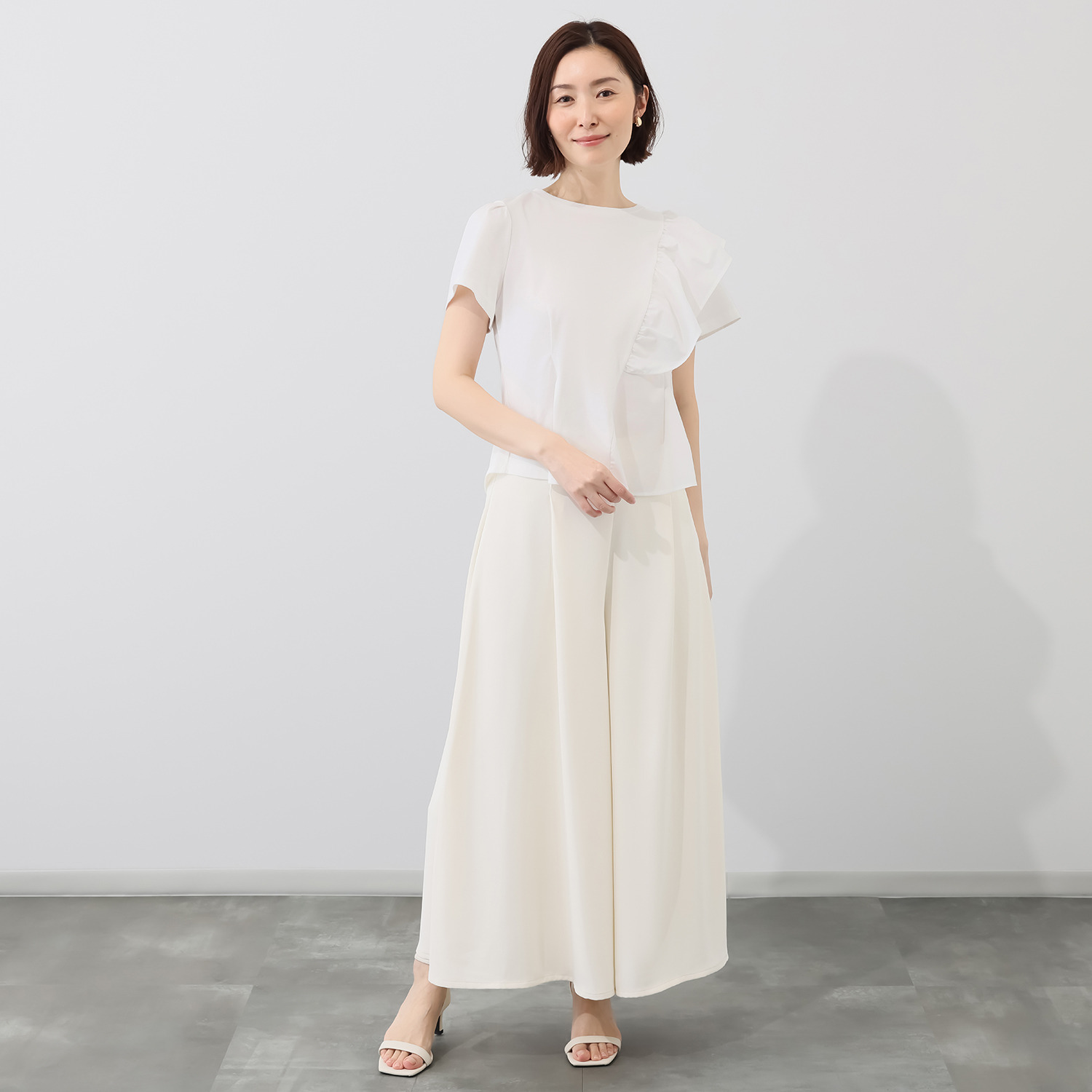 ブルーコレクション フリルアクセント アシンメトリーデザイン カットソープルオーバー