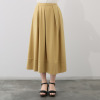 ヤエアジュテ ランダムタックデザインと コクーンシルエットで 主役級ロングスカート