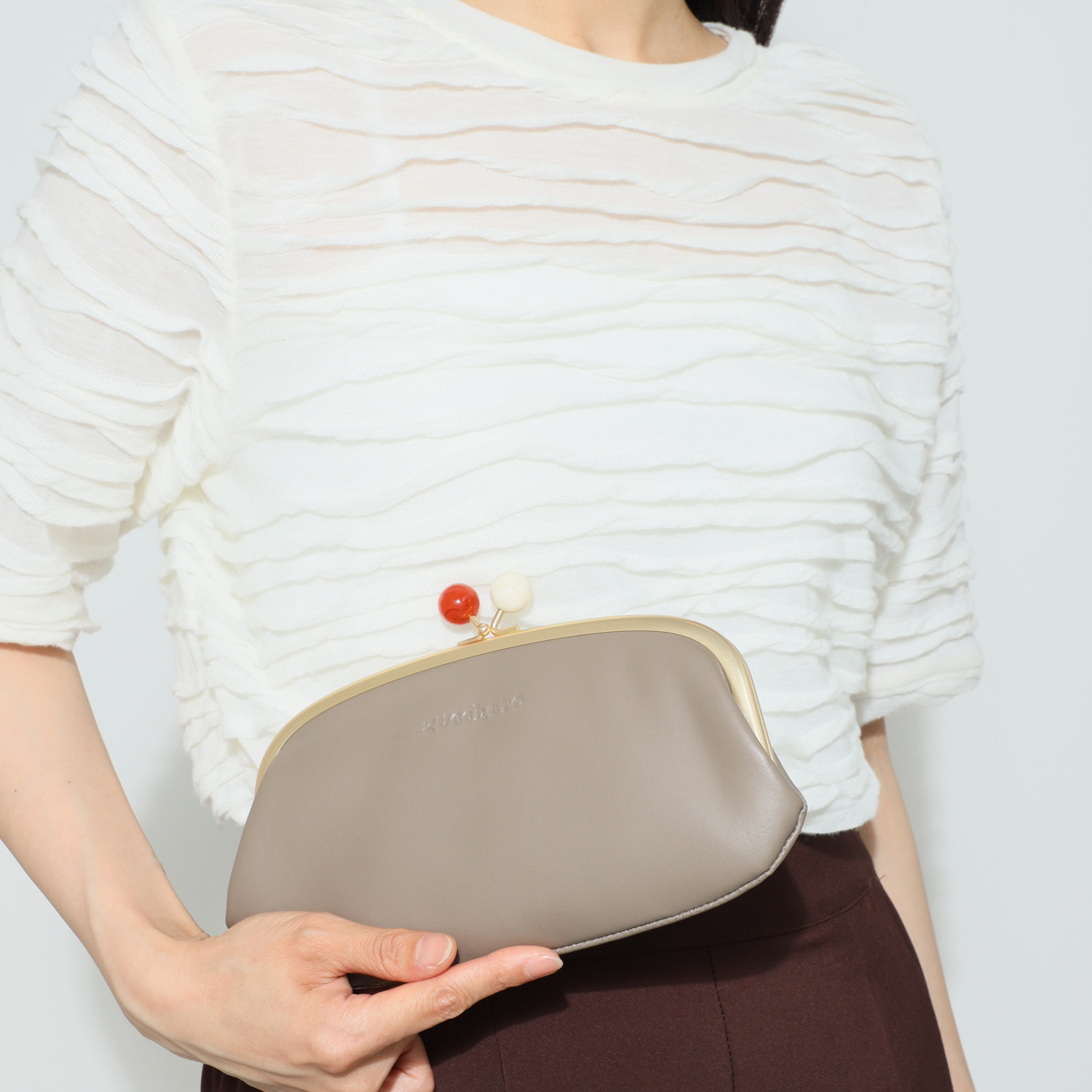 ズッケロ ＜日本製＞ アクリル玉がま口 スリム長財布