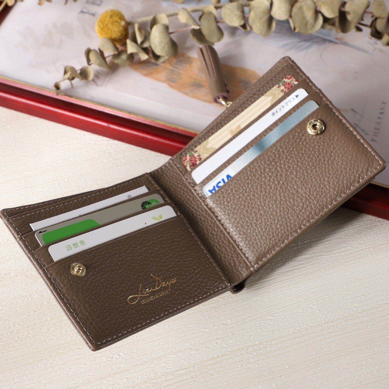 リズデイズ 牛革タッセル 二つ折り財布