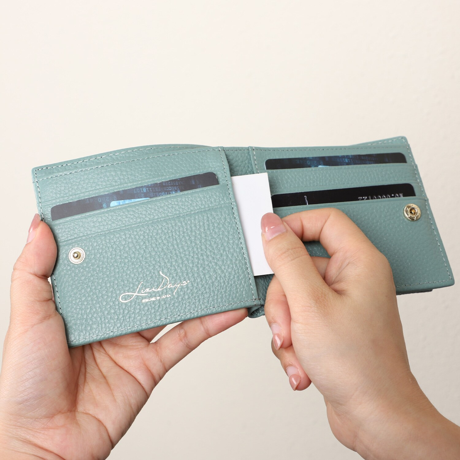 リズデイズ 牛革タッセル 二つ折り財布