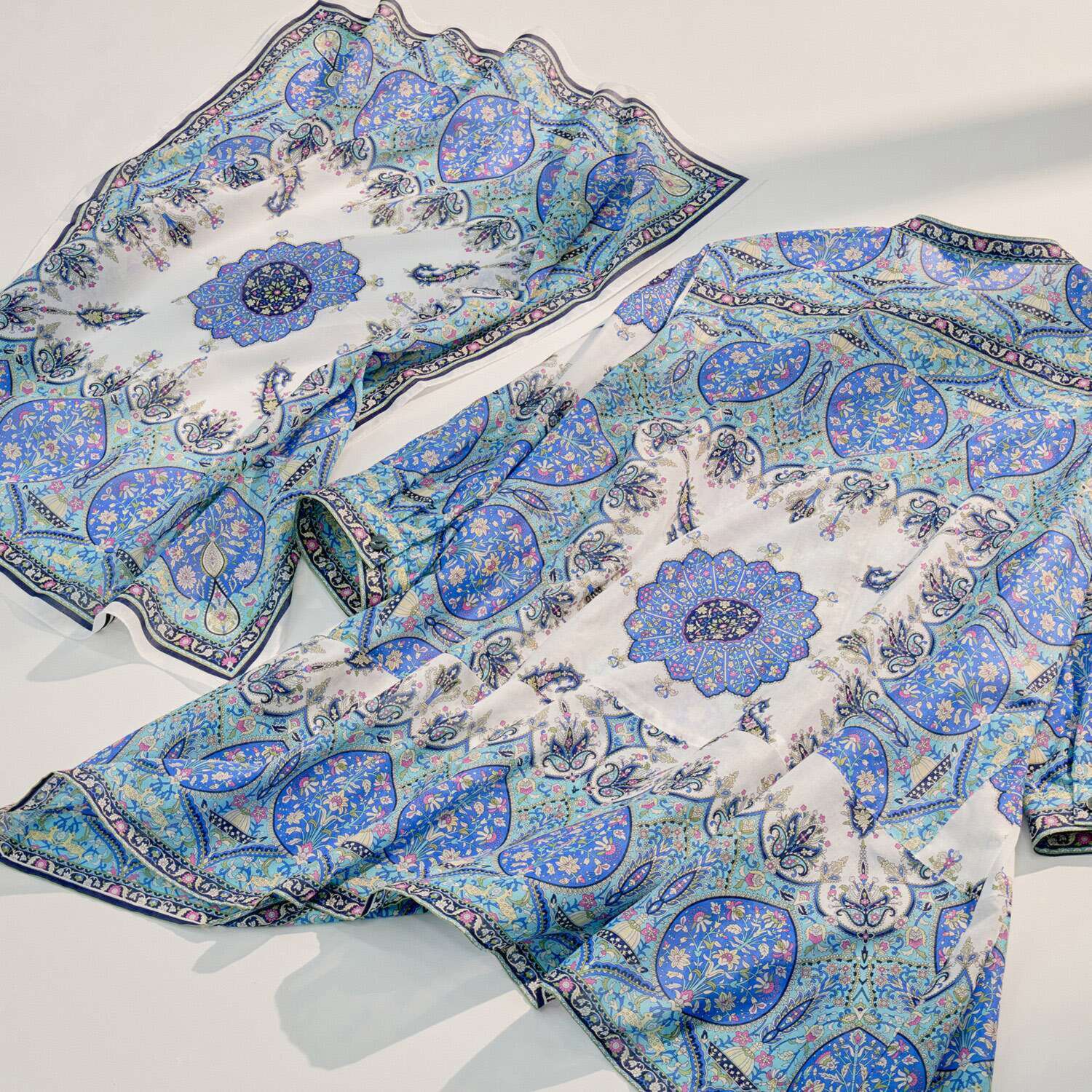 シルクロードクラブ カシミール柄 イレギュラーヘム スタンドカラー 七分袖チュニック