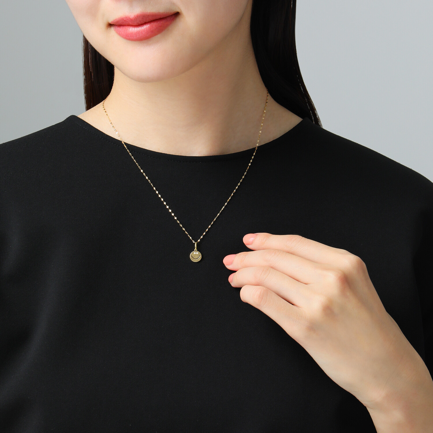 エクラプリュス １８Ｋ ダイヤモンドアイ スマイル リバーシブル ペンダントトップ
