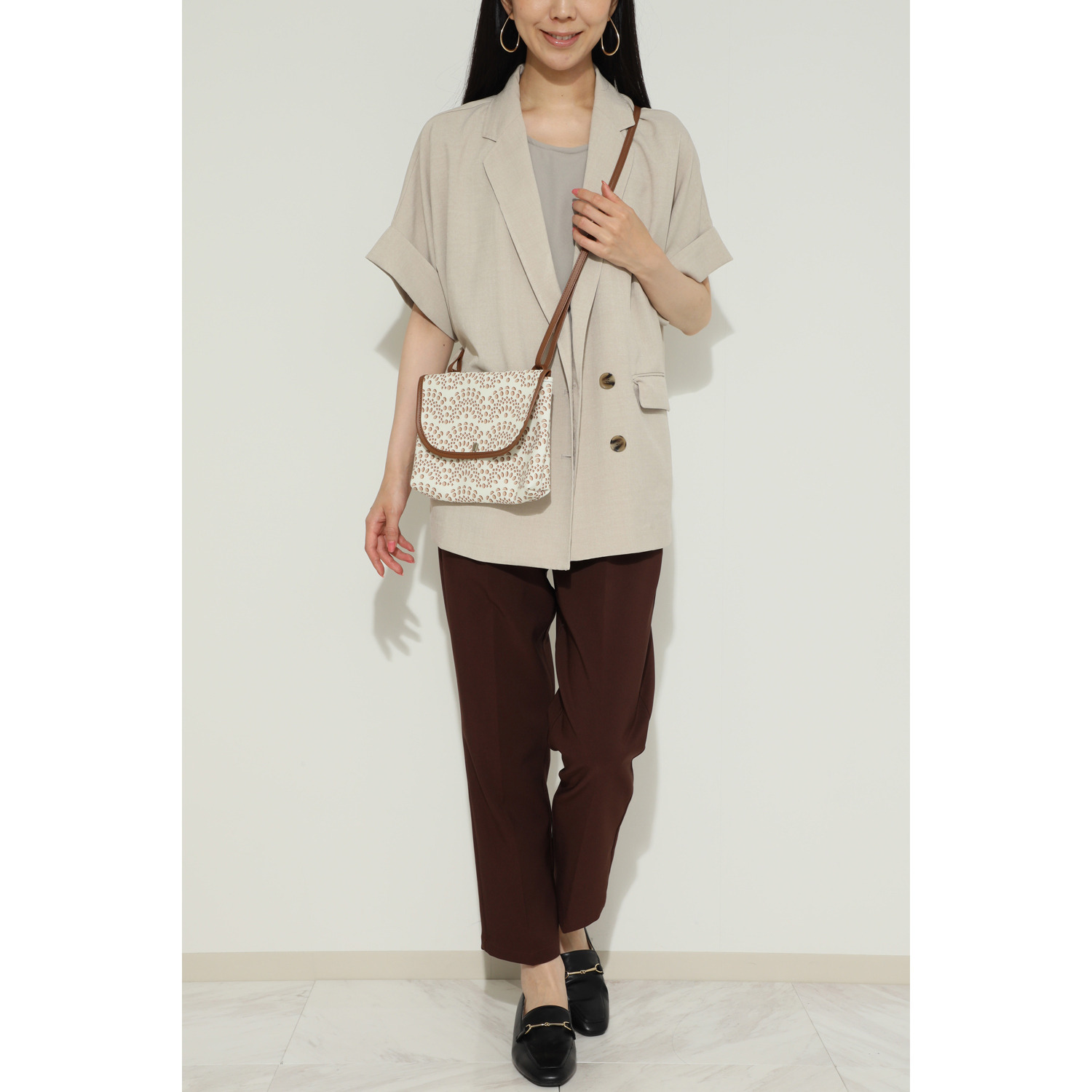 タマミ　ワタナベ ショルダーバッグ “トリックポーチ”