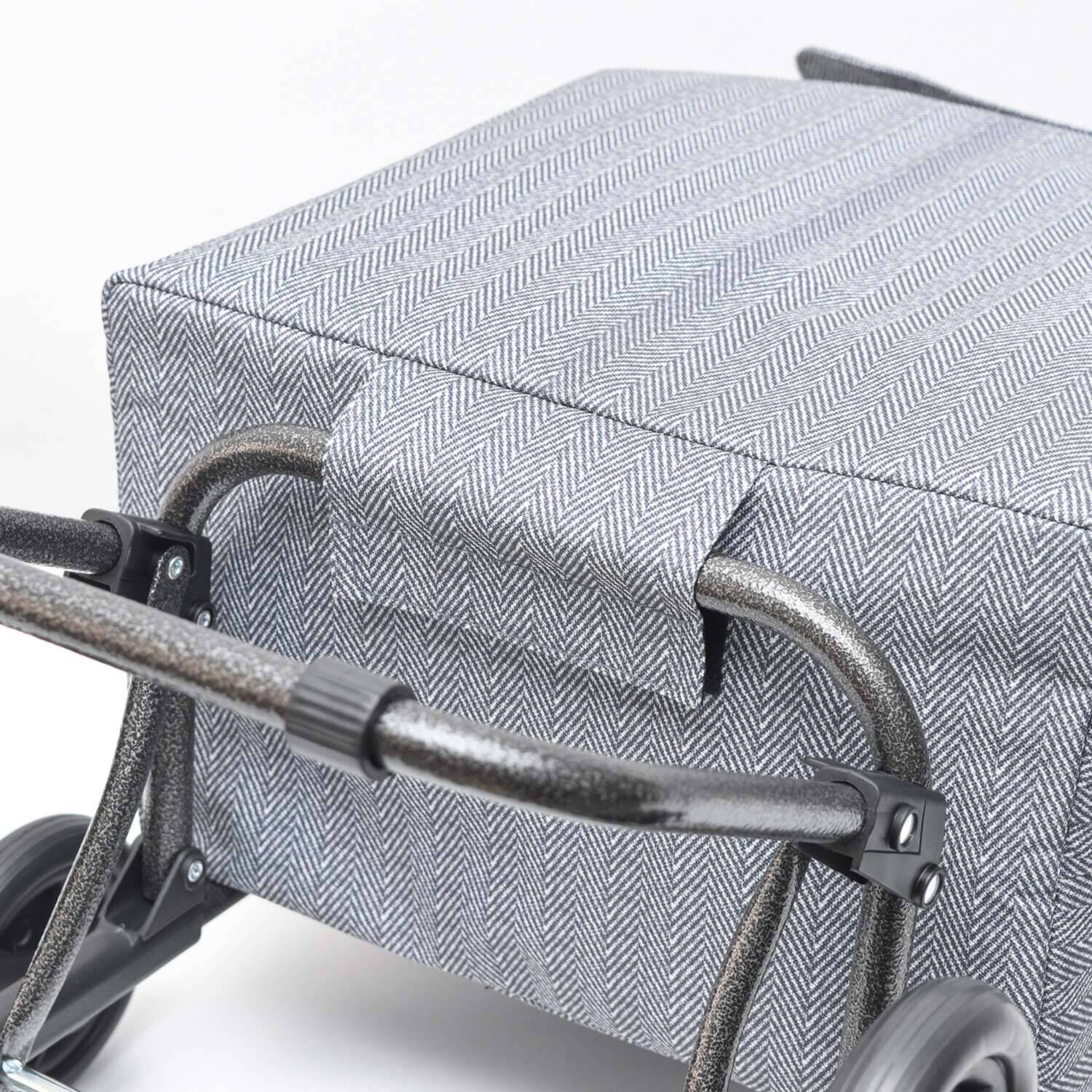 片側３輪タイヤが 段差や階段の移動を 楽々に！ 段差らくらくキャリー エシック