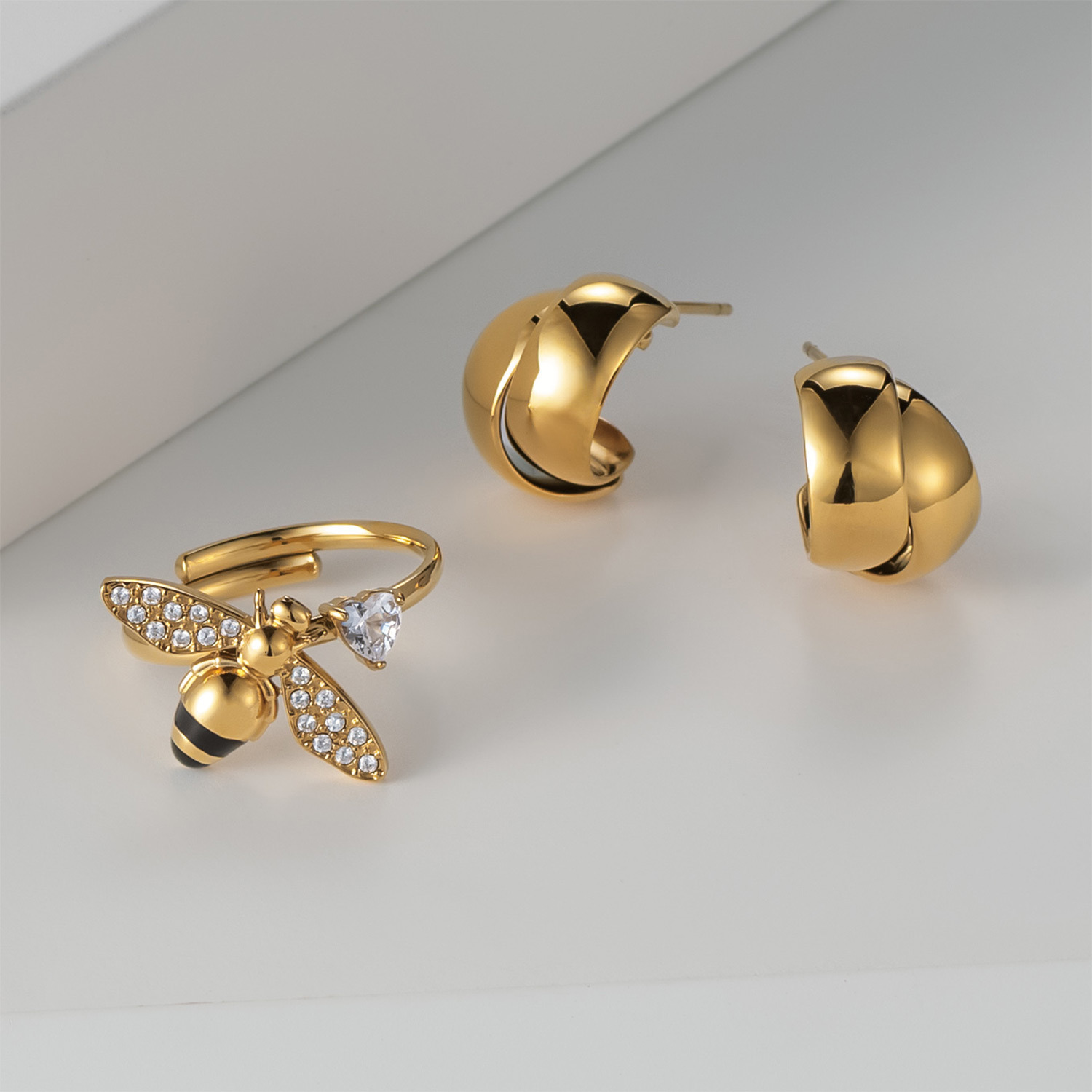 キラレ ステンレス ふんわり甲丸ライン クロスデザイン イヤリング／ピアス