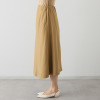 ヤエアジュテ アシンメトリーでモードを フレアーで優雅に はき心地やさしい ドレープデザインスカート