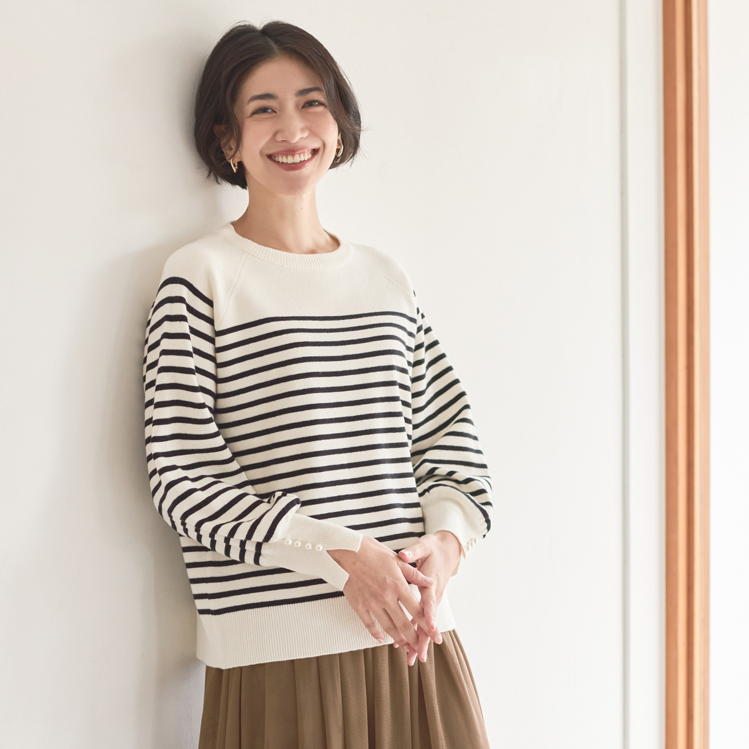 ルクオーレ パール調ボタンアクセント ニットプルオーバー