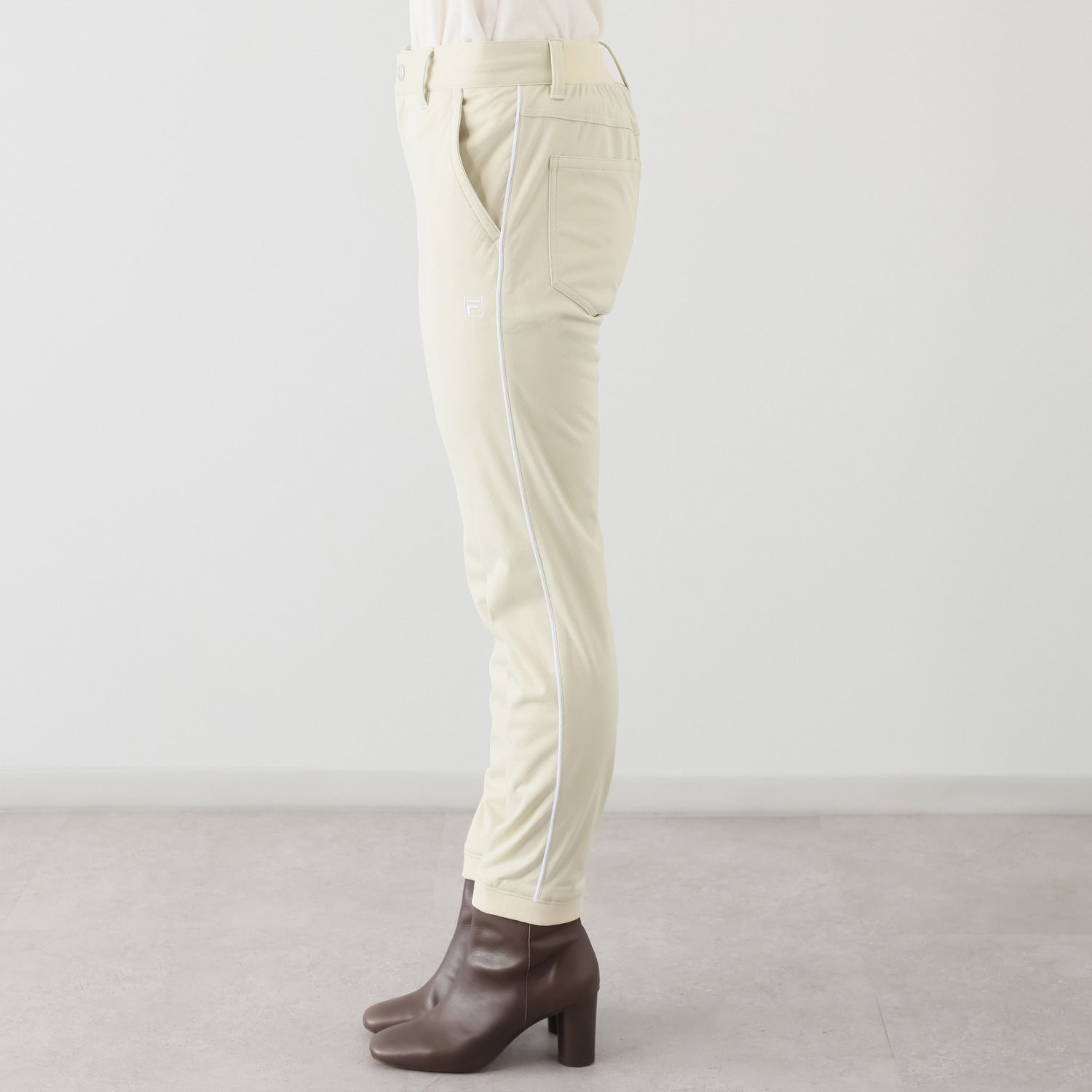 フィラ 防風 ライトボンディング ロングパンツ