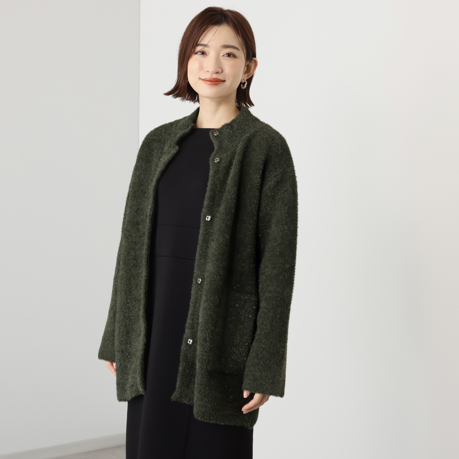 トマケトマ シャギーラメ スタンドカラー ニットコーディガン