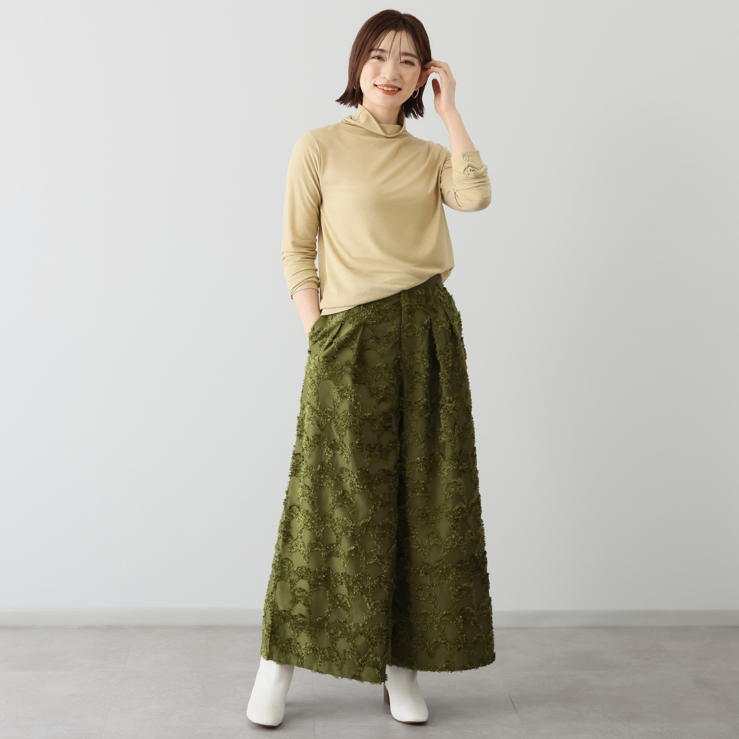 トマケトマ シームレスネック 袖口ボタンアクセント ラメカットソー プルオーバー