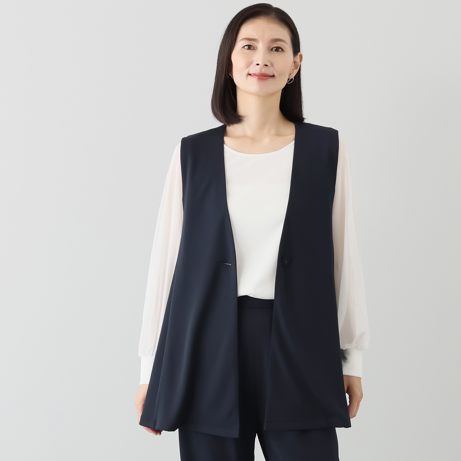 ヴィアッジャーレ ドレープジャージー フレアーシルエットジレ