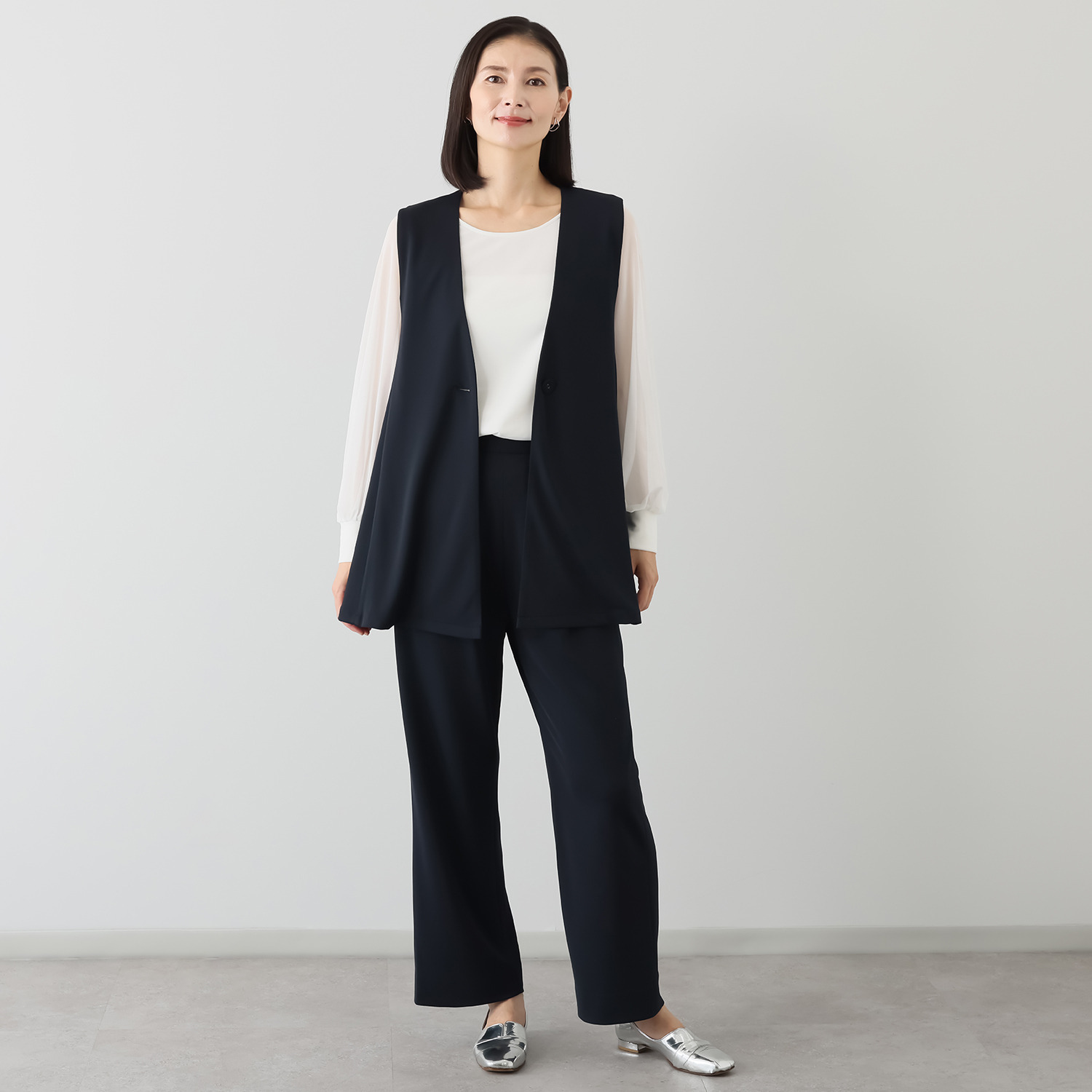 ヴィアッジャーレ ドレープジャージー フレアーシルエットジレ