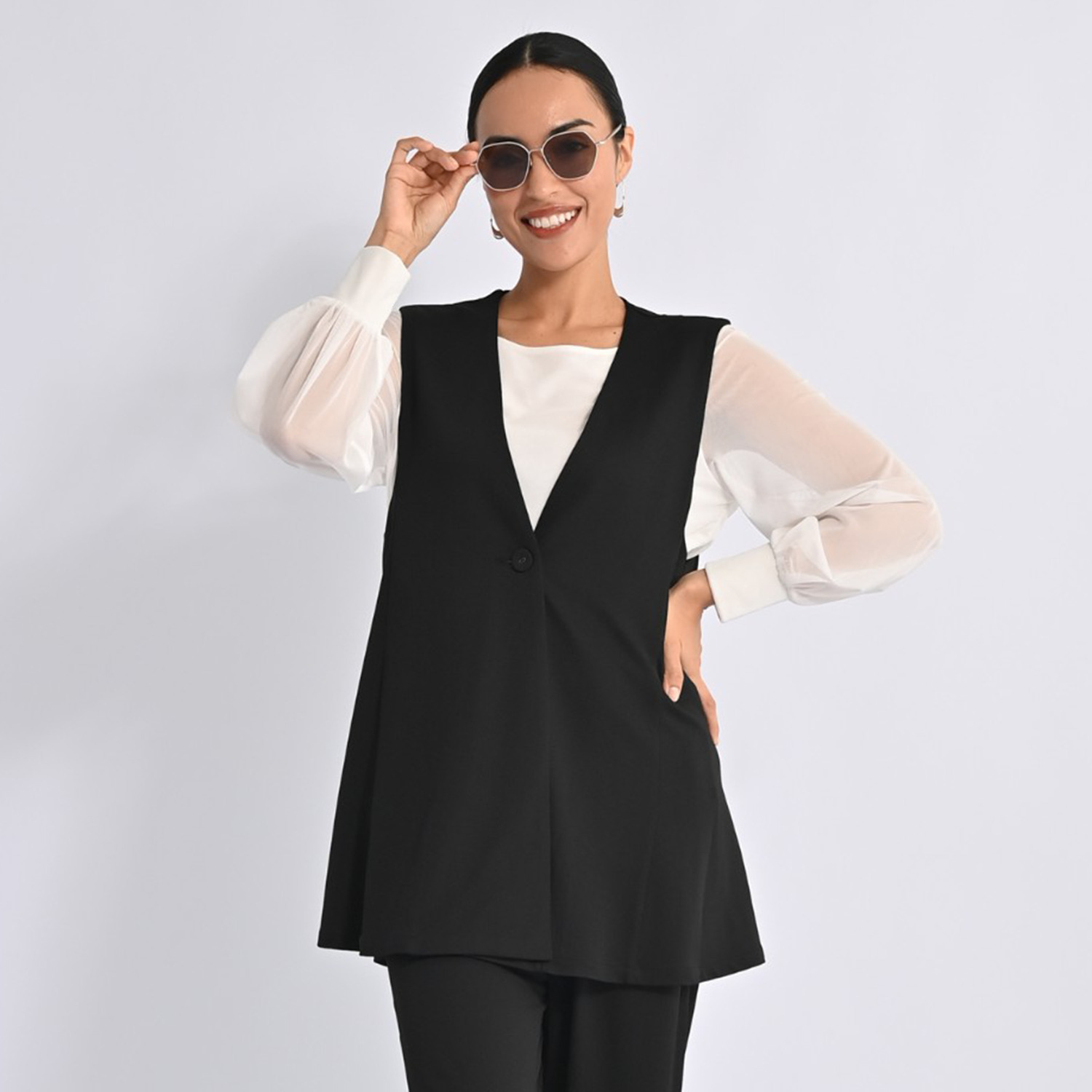 ヴィアッジャーレ ドレープジャージー フレアーシルエットジレ