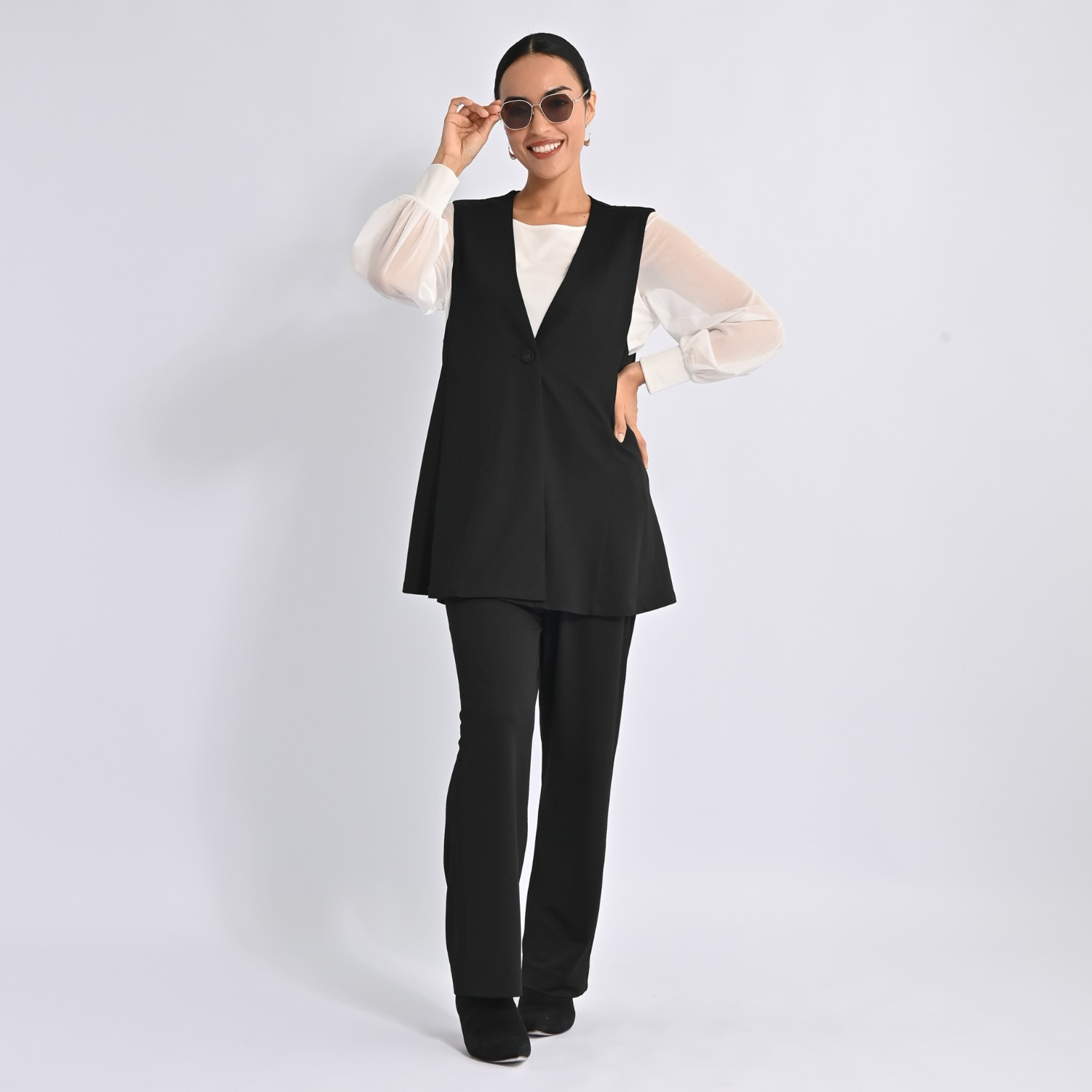 ヴィアッジャーレ ドレープジャージー フレアーシルエットジレ