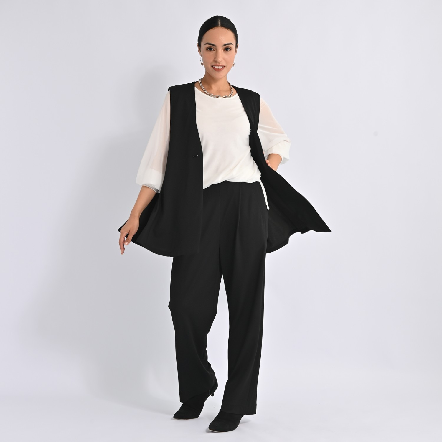 ヴィアッジャーレ ドレープジャージー フレアーシルエットジレ