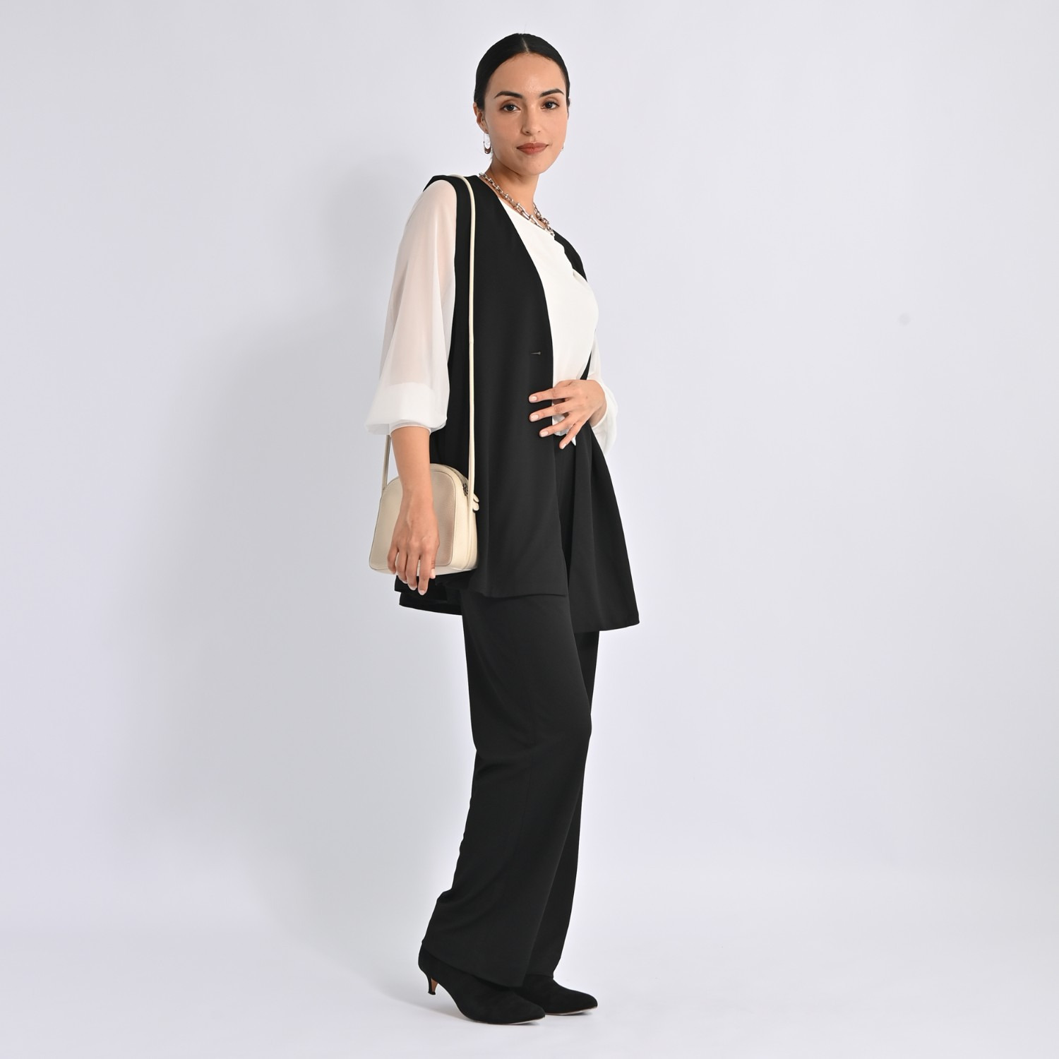 ヴィアッジャーレ ドレープジャージー フレアーシルエットジレ