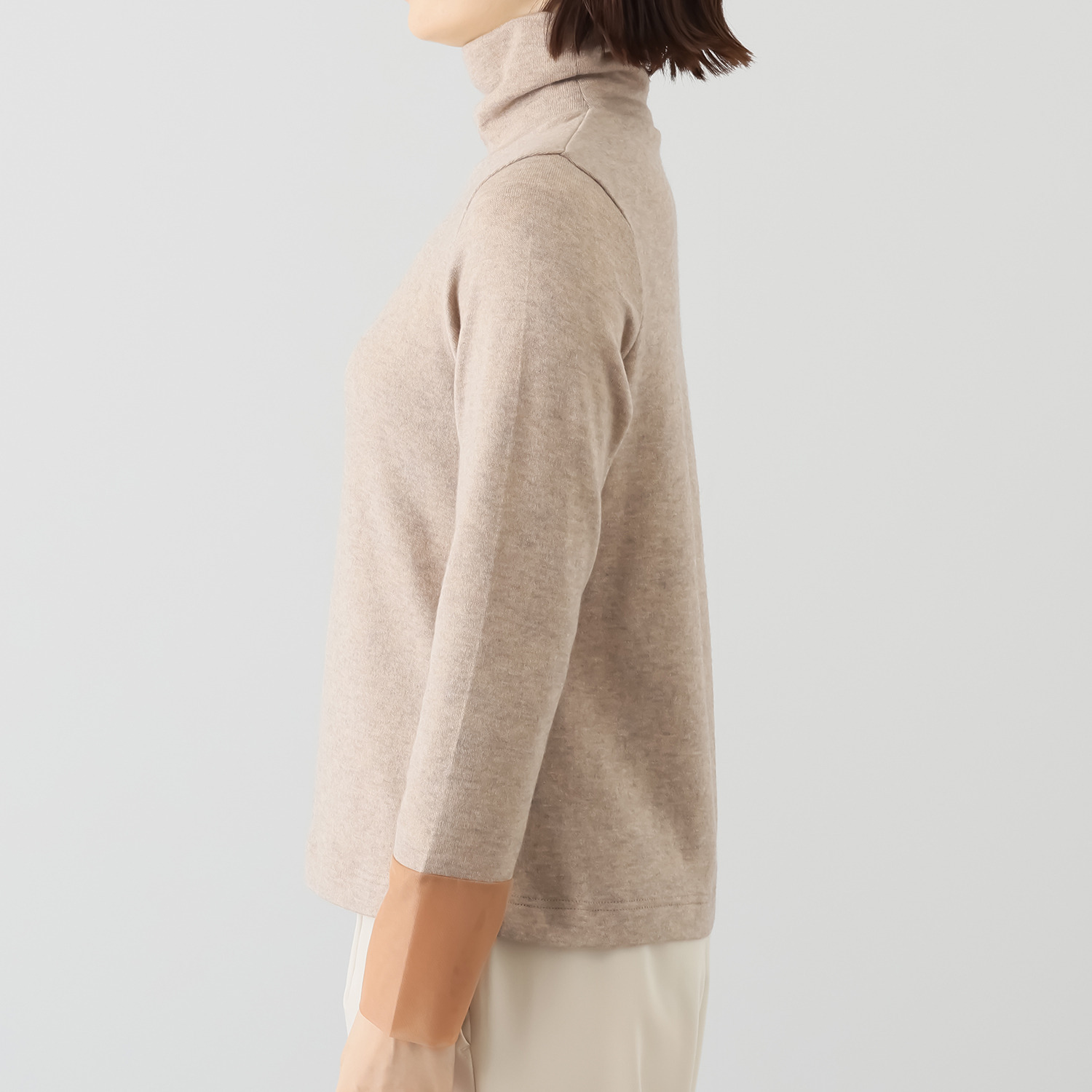 ボンボン・エ・ショコラ タートルネック カフスチュールトップス