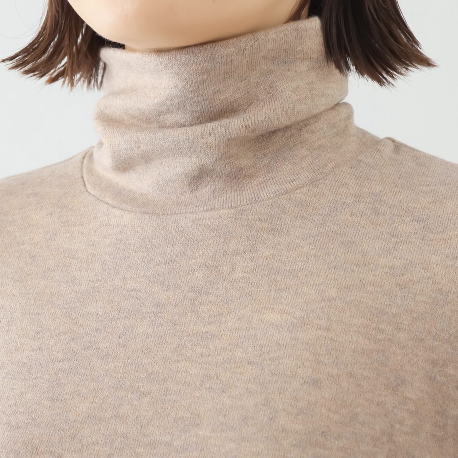 ボンボン・エ・ショコラ タートルネック カフスチュールトップス