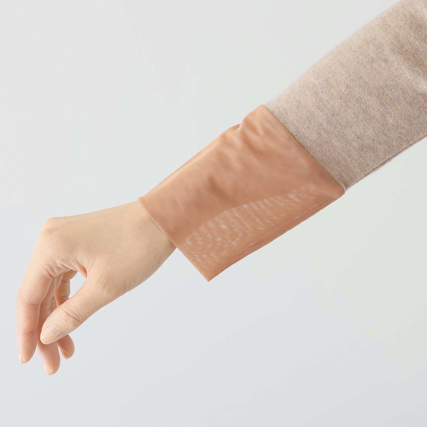 ボンボン・エ・ショコラ タートルネック カフスチュールトップス