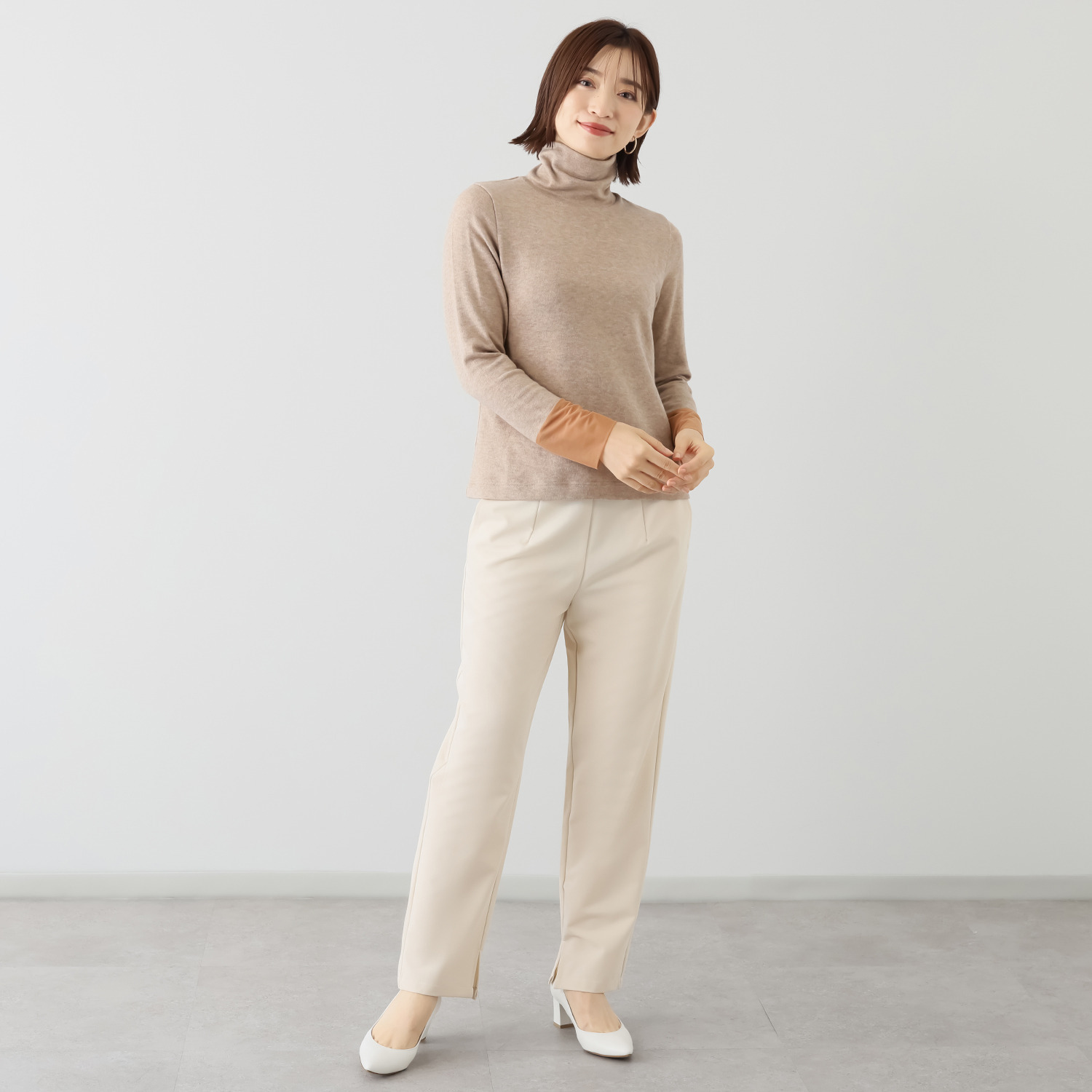 ボンボン・エ・ショコラ タートルネック カフスチュールトップス