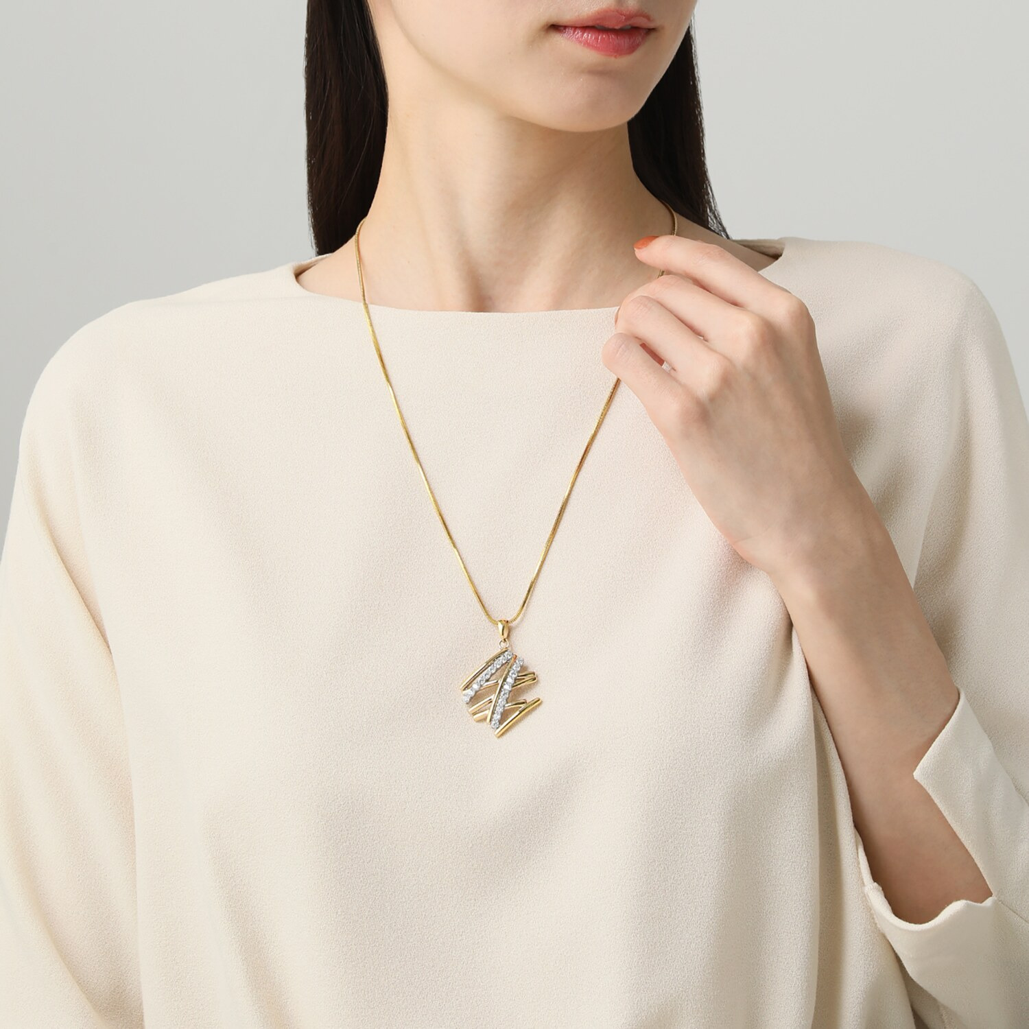 デルークス サージカルステンレス ＣＺ ツートーンデザイン ルミナスロングペンダント