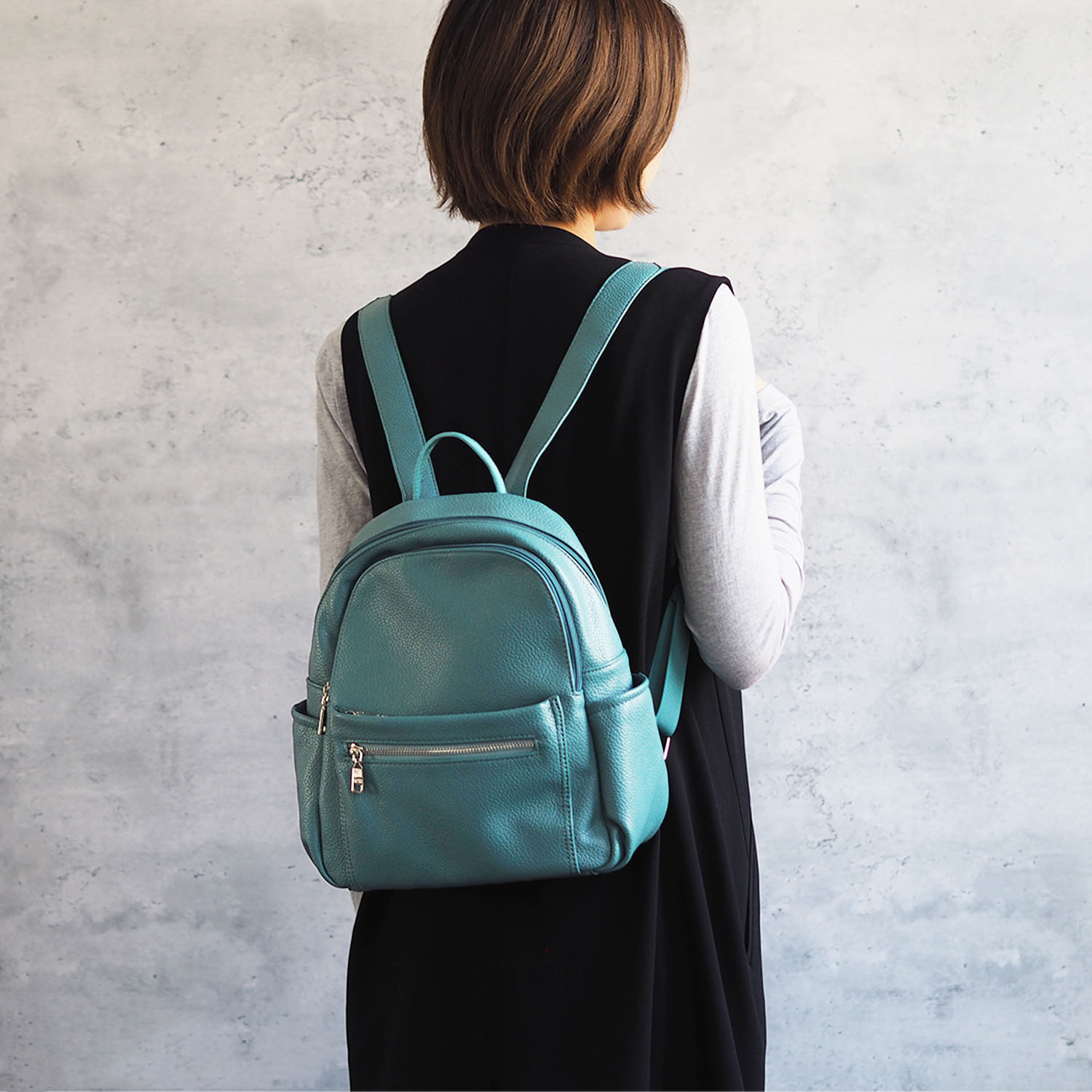 グッシオイタリー ポケットたっぷり ラウンド型ミニリュック