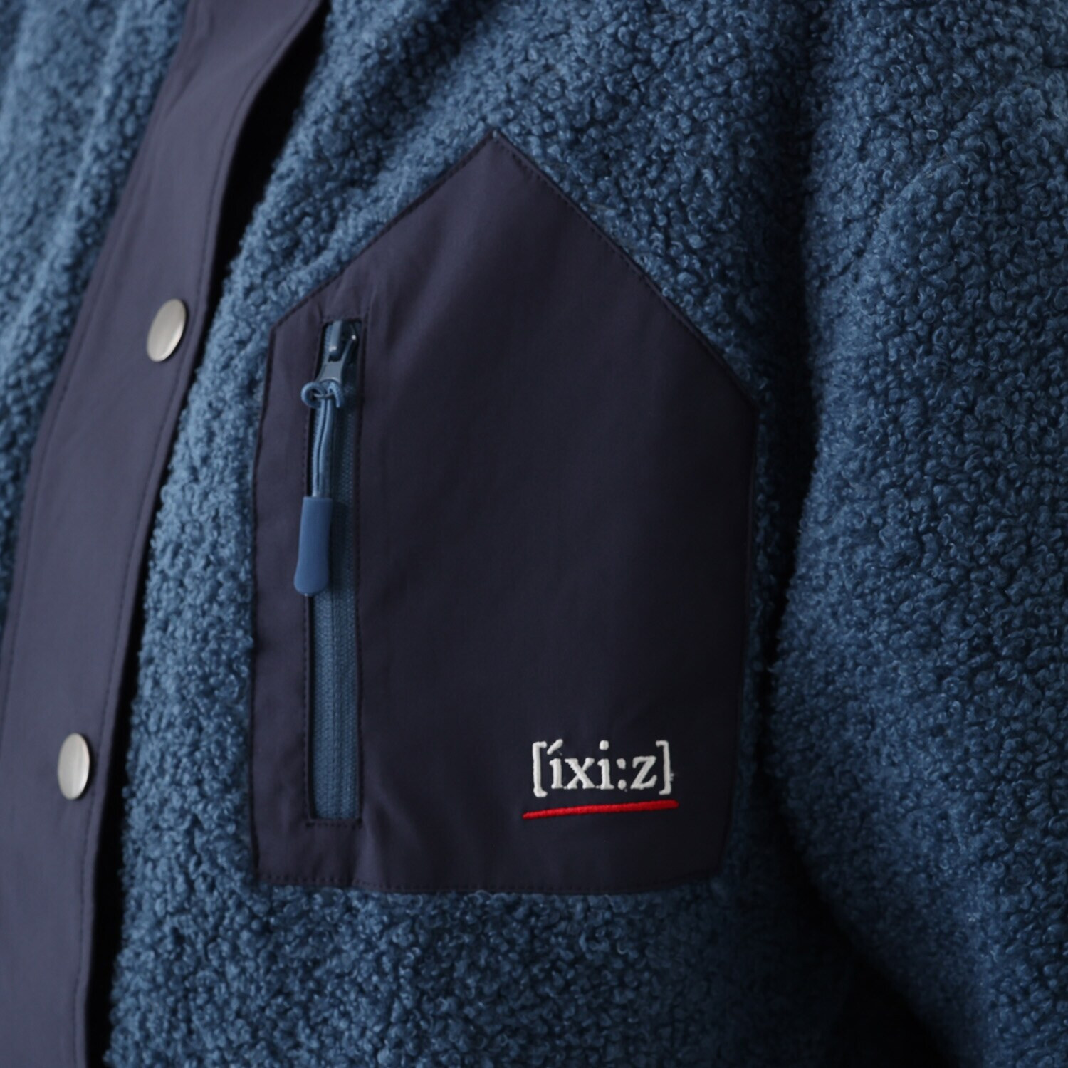 イクシーズ コクーンシルエット バイカラー ボアブルゾン