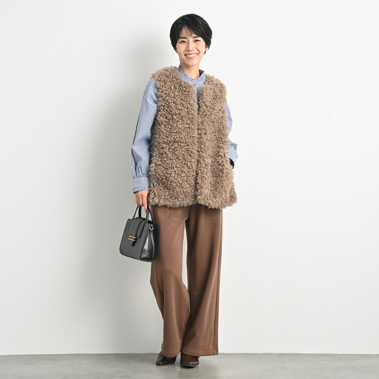 ゼラールスポーツ きれいめ艶やか カーリーフェイクファー ミディ丈ベスト