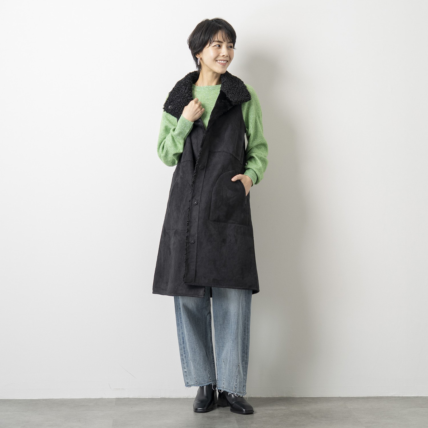 ゼラールスポーツ フェイクムートン リバーシブルで楽しめる ファー切替デザイン スタンドネックロングジレ