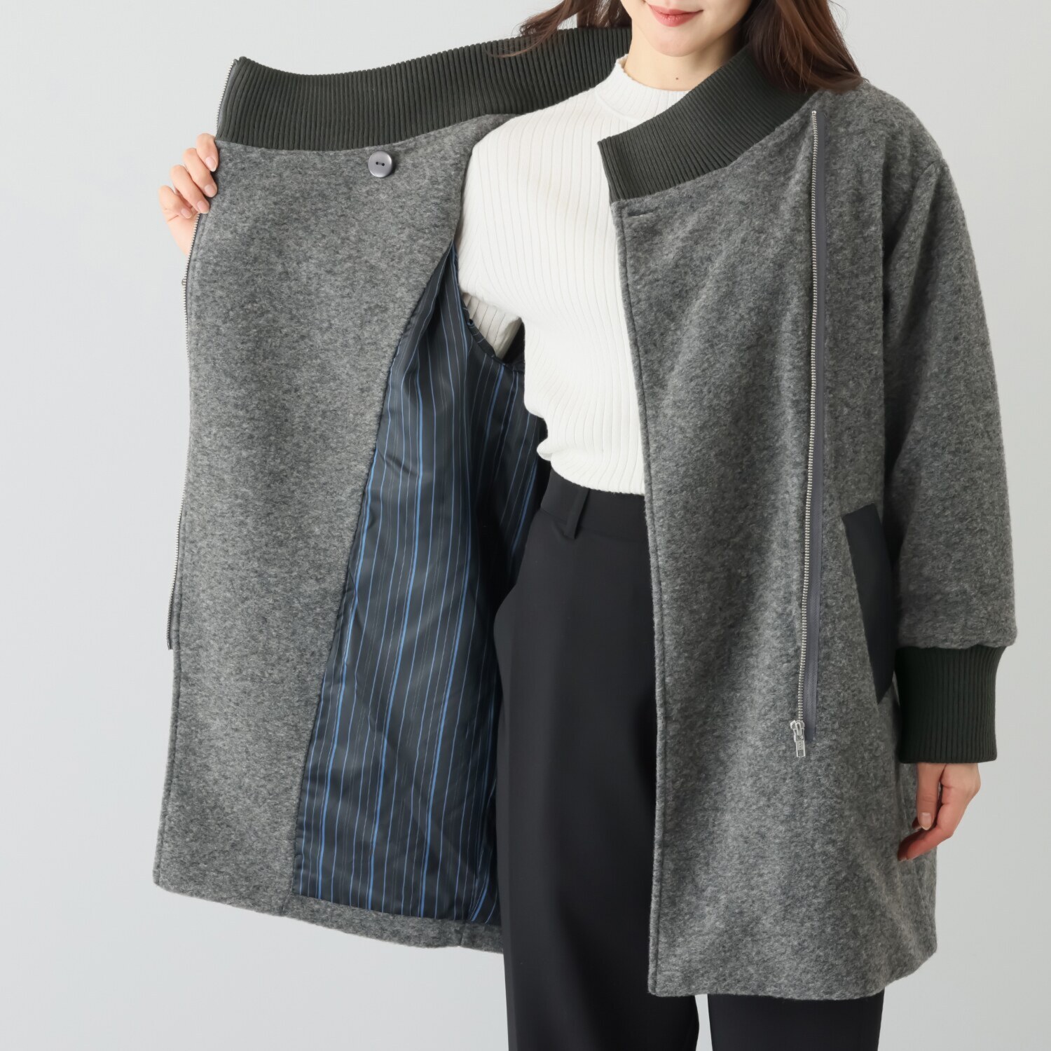 コモエリークローゼット 異素材＆ アシメジップが光るコート