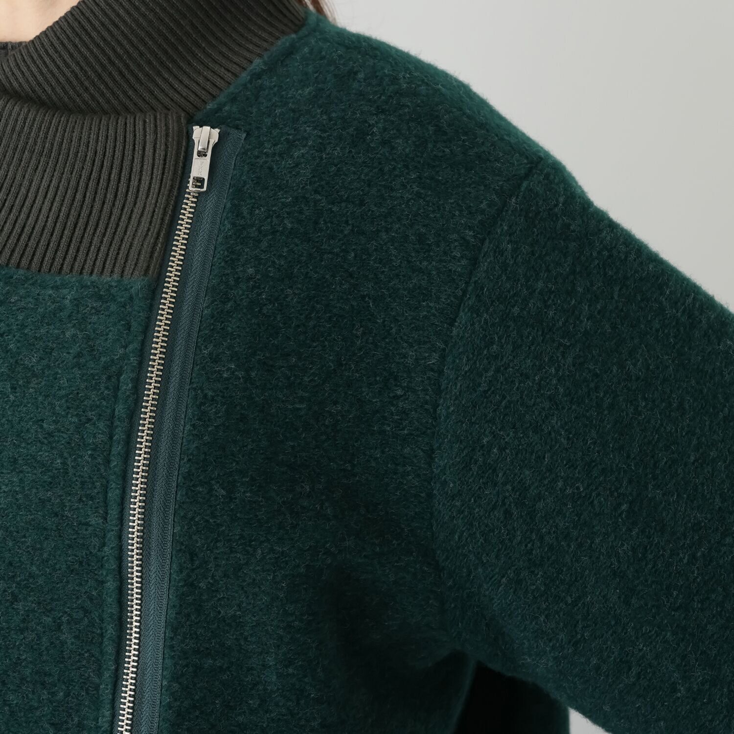 コモエリークローゼット 異素材＆ アシメジップが光るコート