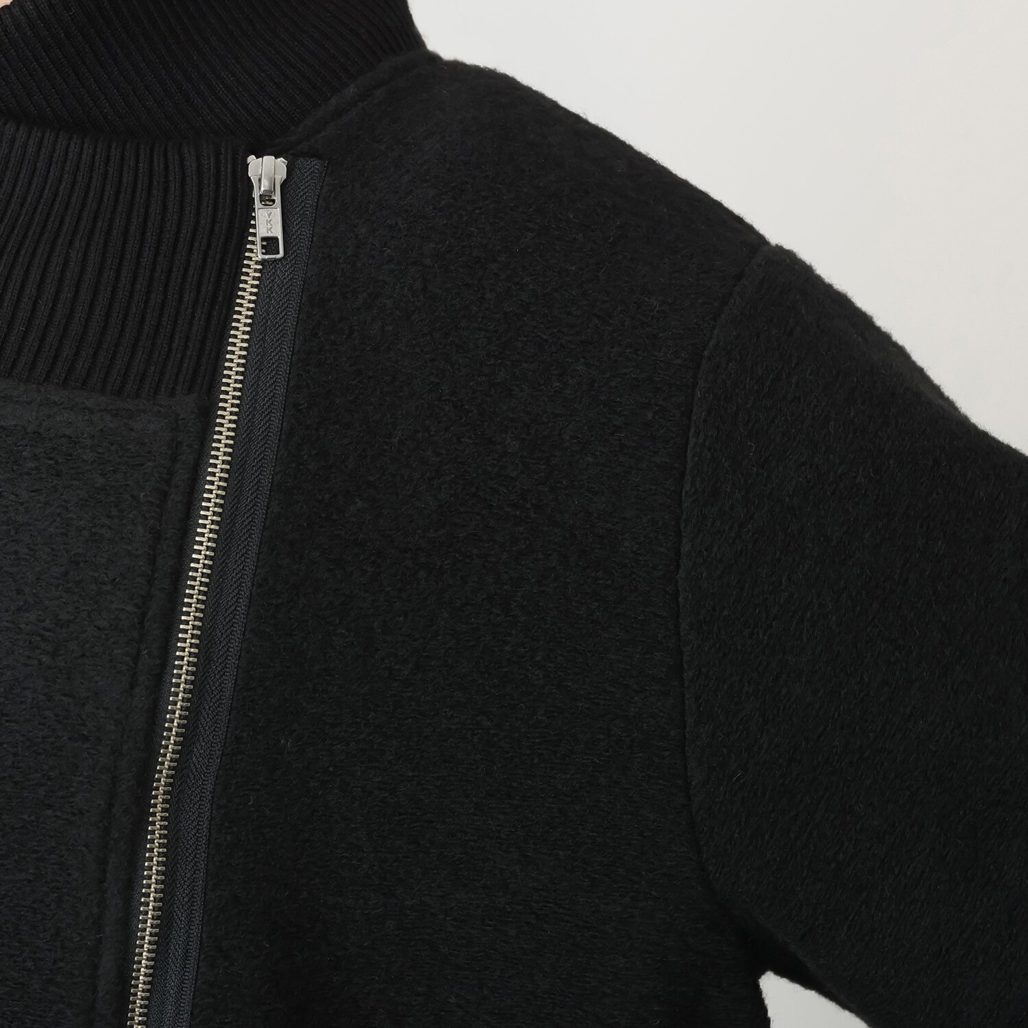 コモエリークローゼット 異素材＆ アシメジップが光るコート