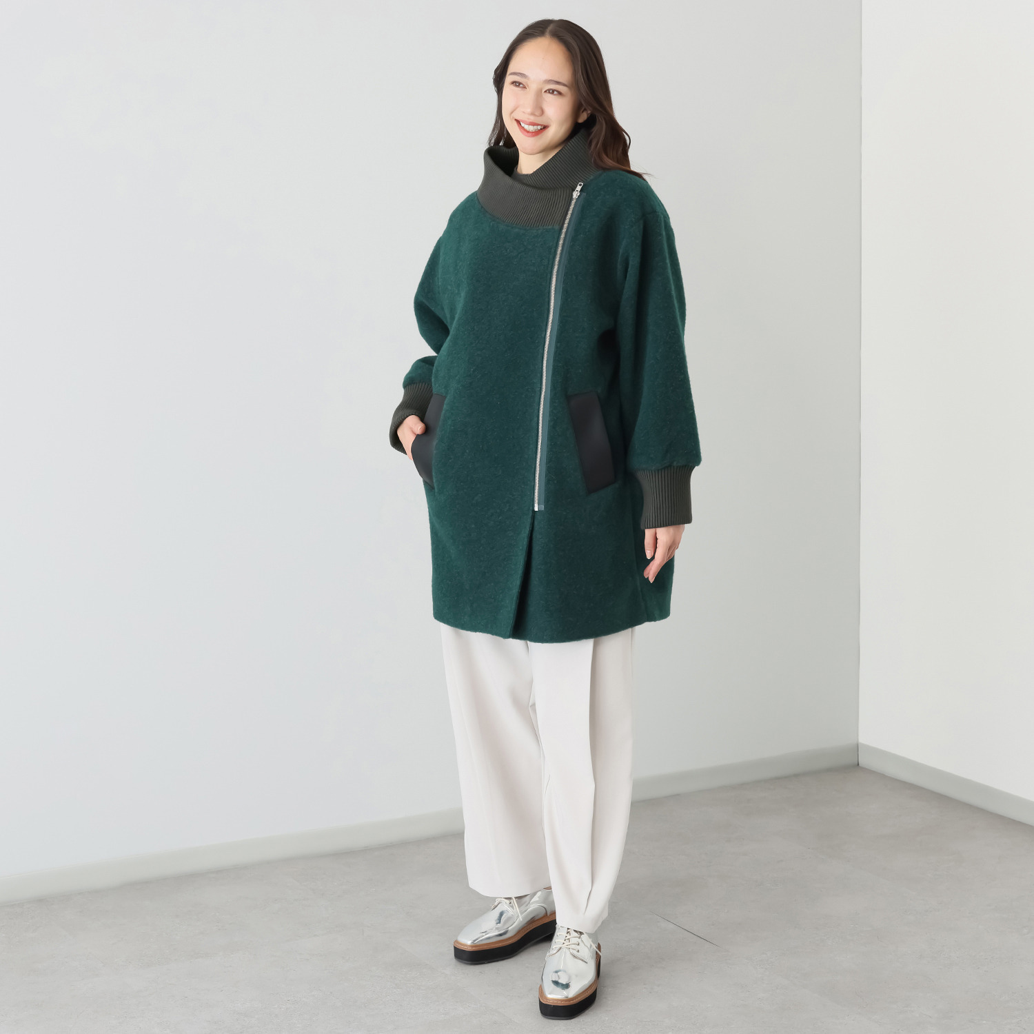 コモエリークローゼット 異素材＆ アシメジップが光るコート