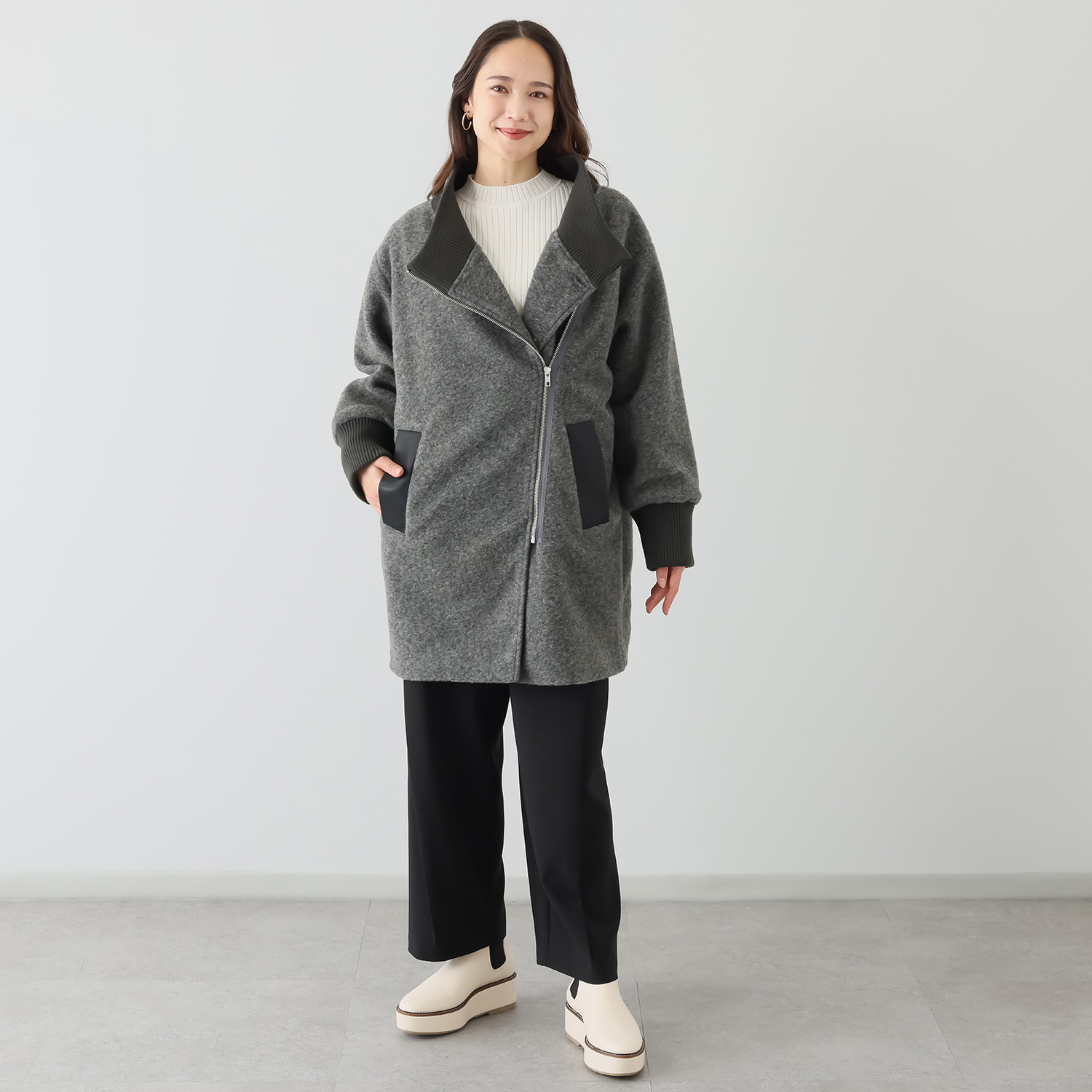 コモエリークローゼット 異素材＆ アシメジップが光るコート