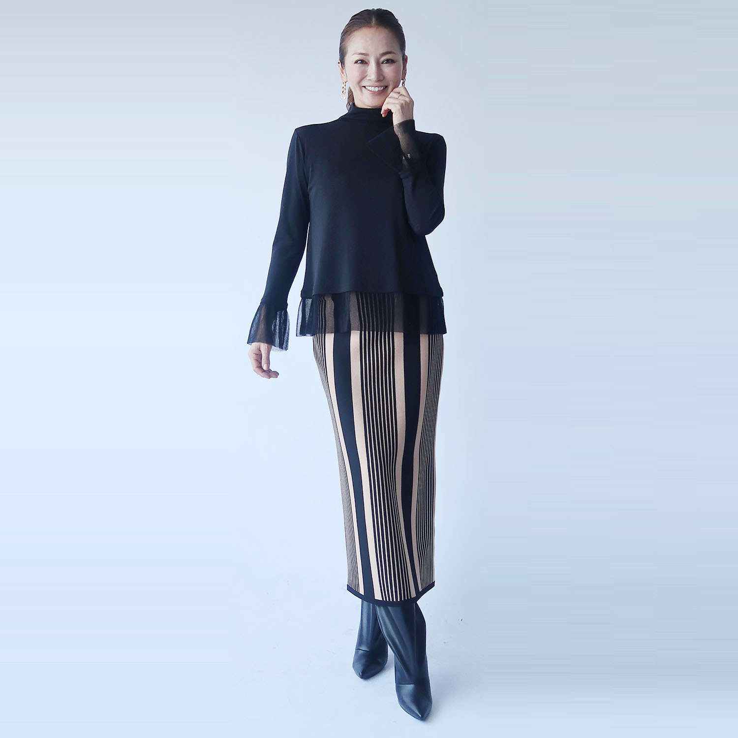 フーア ちら見せプリーツチュール ボトルネックプルオーバー