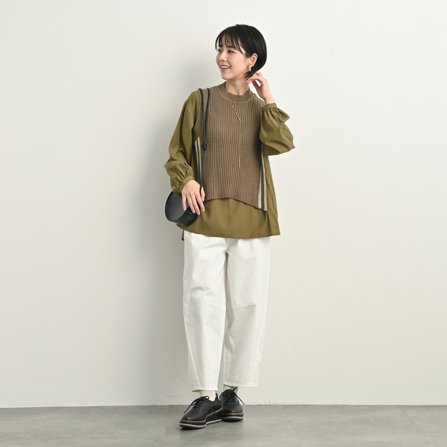 ゼラールスポーツ ニットドッキング レイヤード風デザイン チュニックブラウス