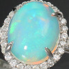 サープライズ プラチナ９５０ １カラットＵＰオパール＆ ダイヤモンド オーバルカボションリング