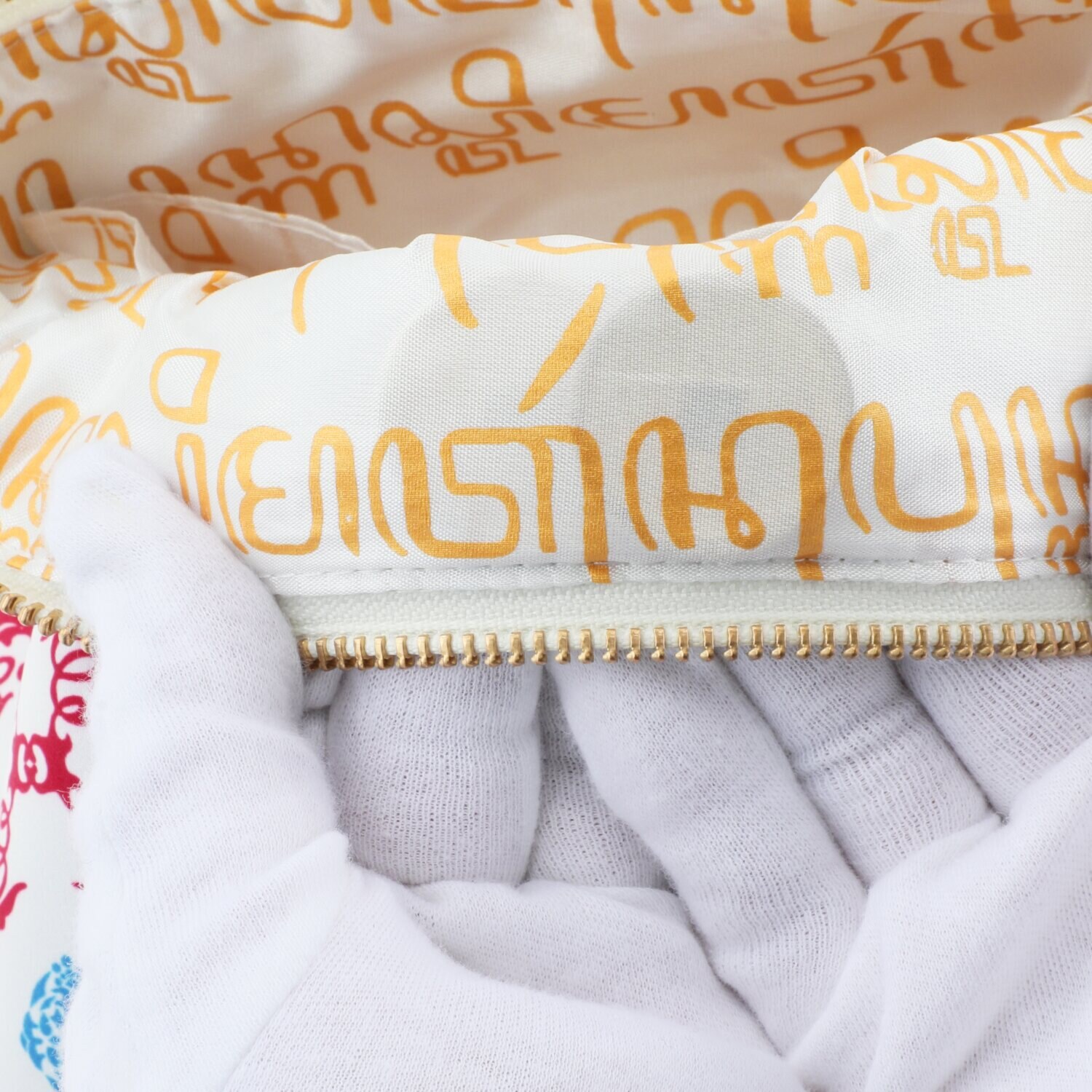 祝！　１０周年記念 お宝ポーチ ＜金財満開＞の象徴 “王蝶花” 〜大金財・大強運・勝守〜