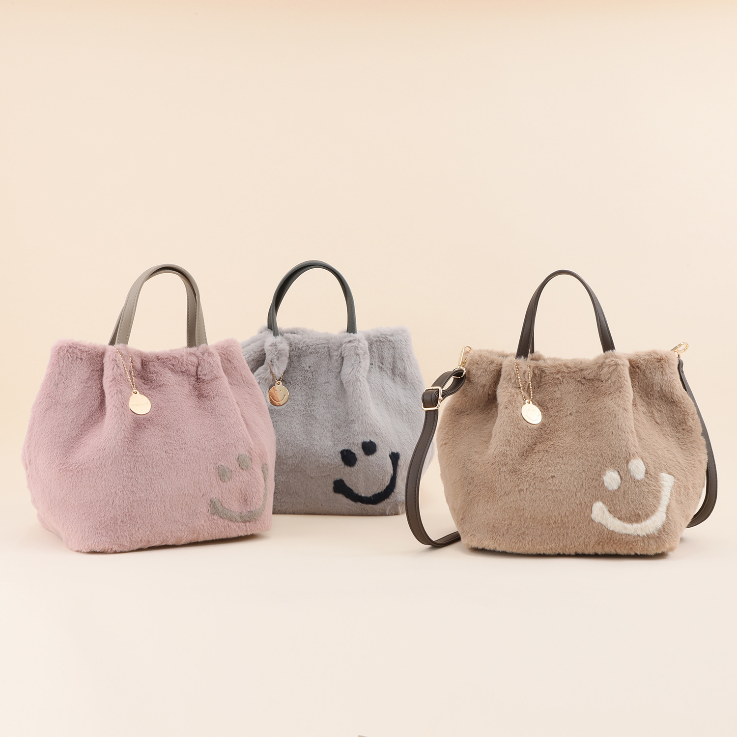 クーコ スマイリーフェイス エコファー ２ウェイトートバッグ