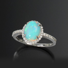 サープライズ プラチナ９５０ １カラットＵＰオパール＆ ダイヤモンド オーバルカボションリング